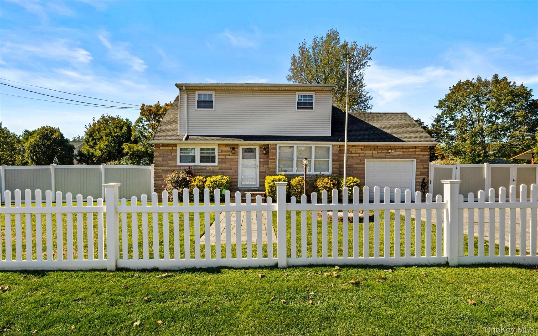 Welcome to 1796 Wells Drive in beautiful Bay Shore !