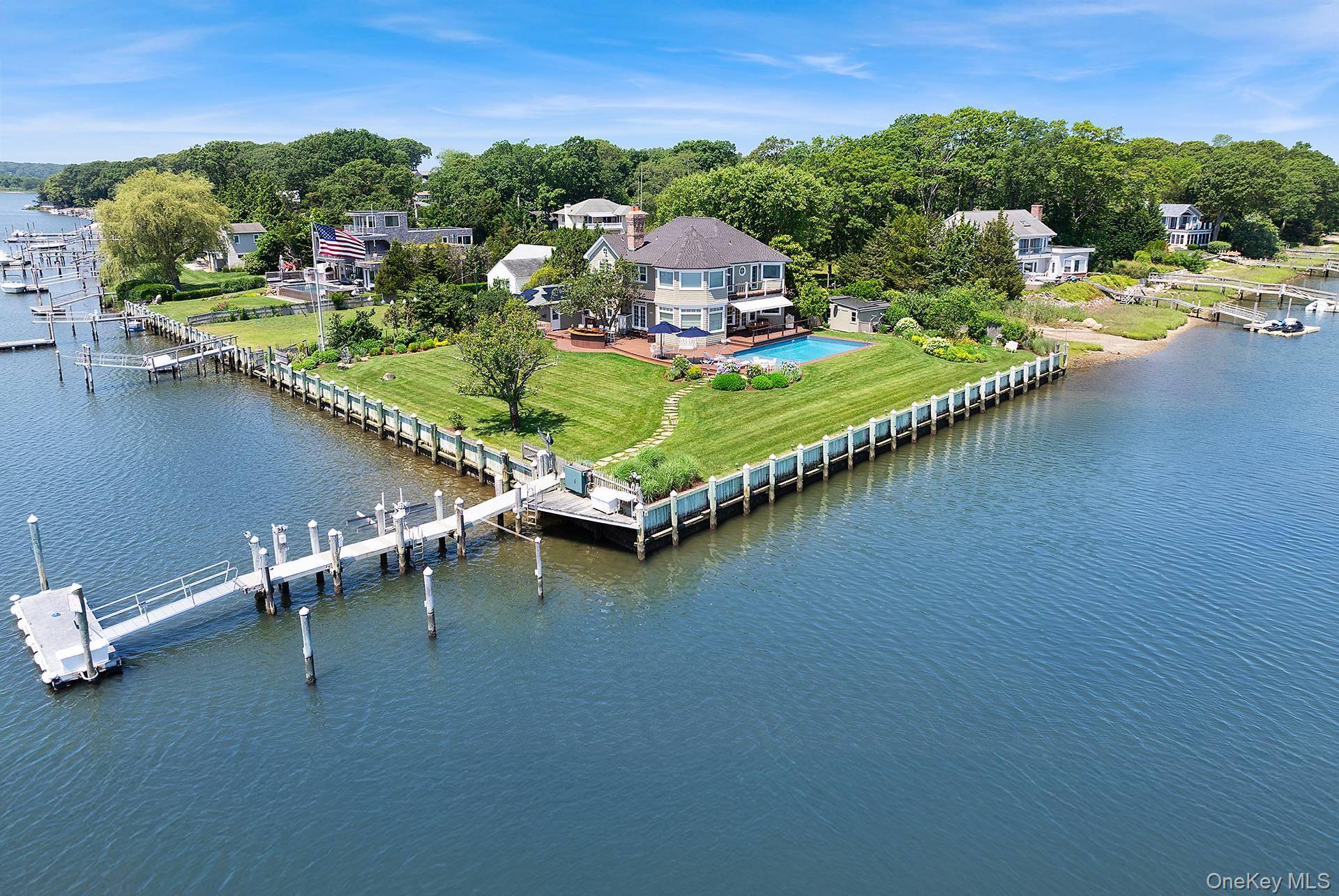 Waterfront boaters' paradise with a full service deep water dock and access to Sag Harbor Bay awaits your arrival.