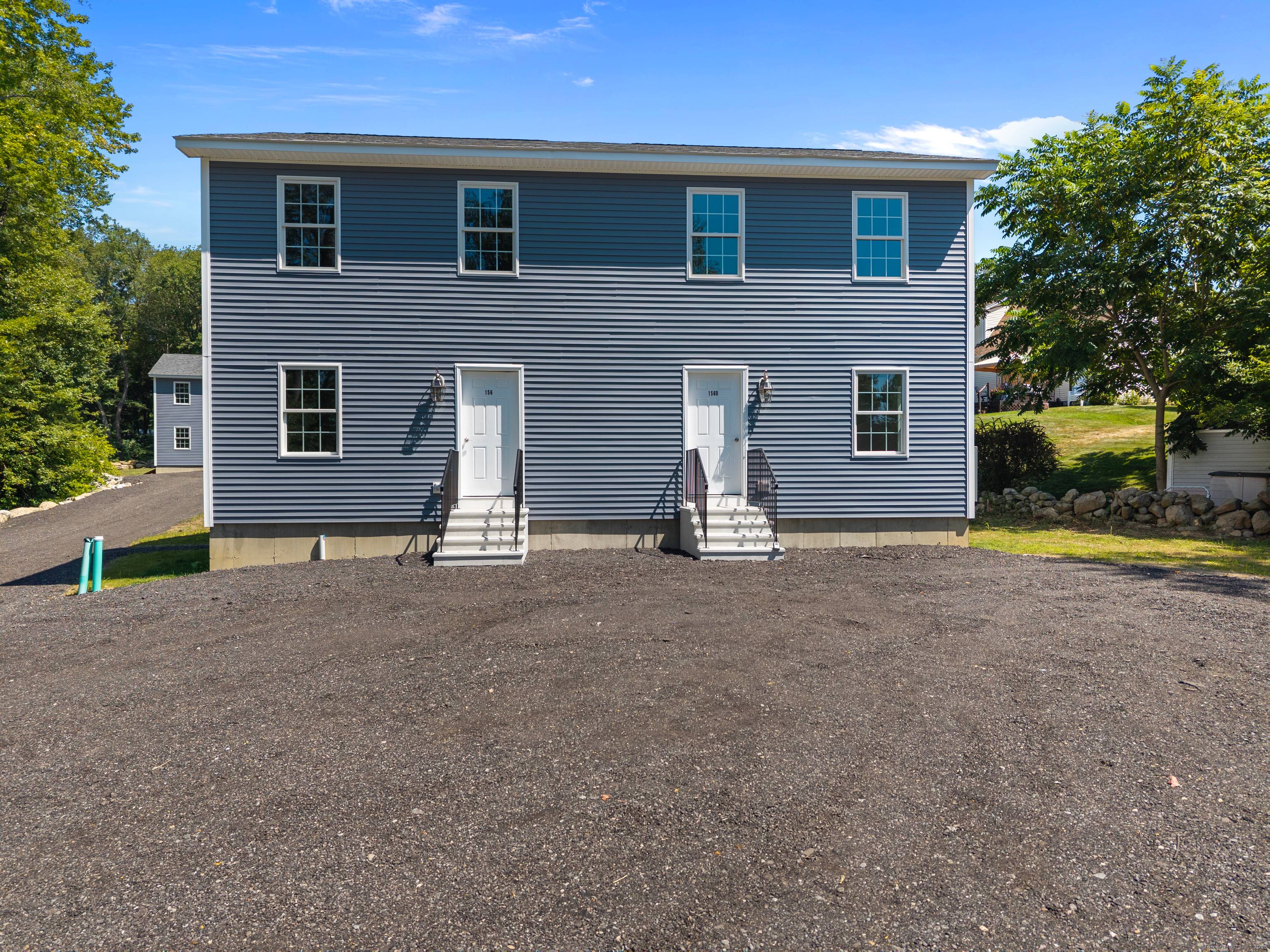 Be the first to own this brand new side by side duplex in the heart of Groton, set back from the road in a private setting !