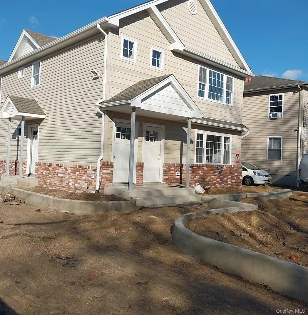 New Construction, beautiful town house with two bedrooms and two bathrooms on a first floor, beautiful wood floor throughout the whole apartment, master bedroom with full bathroom, Livingroom with wood ...