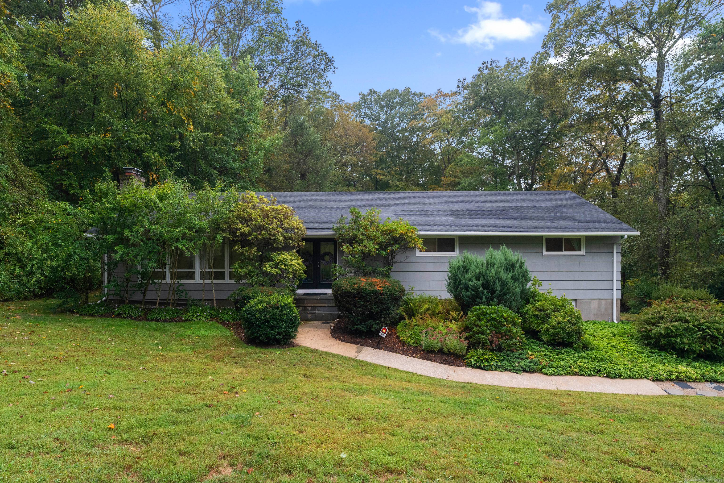 Welcome to 374 Wildwood Drive a beautiful expansive 1, 769 sqft ranch set on 1.
