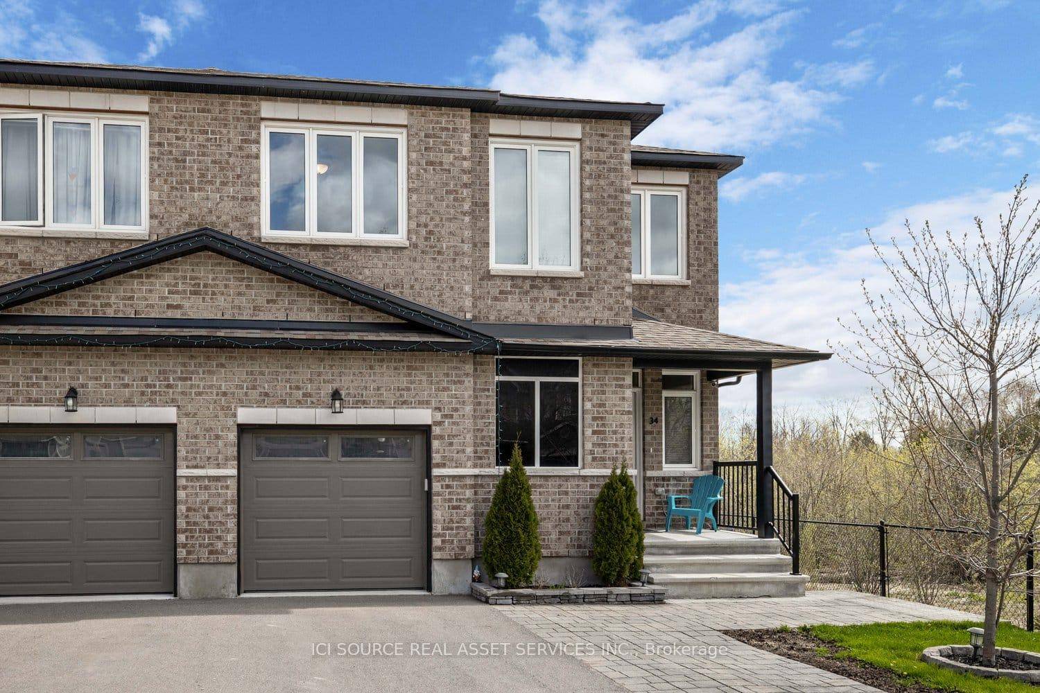 Discover this rare premium end unit townhome in Stittsville, offering unparalleled privacy and serene views of a protected green space.