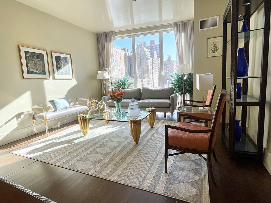 Residence 6B at 255 East 74th Street is a rare offering a 1, 230 square foot one bedroom plus home office with 1.