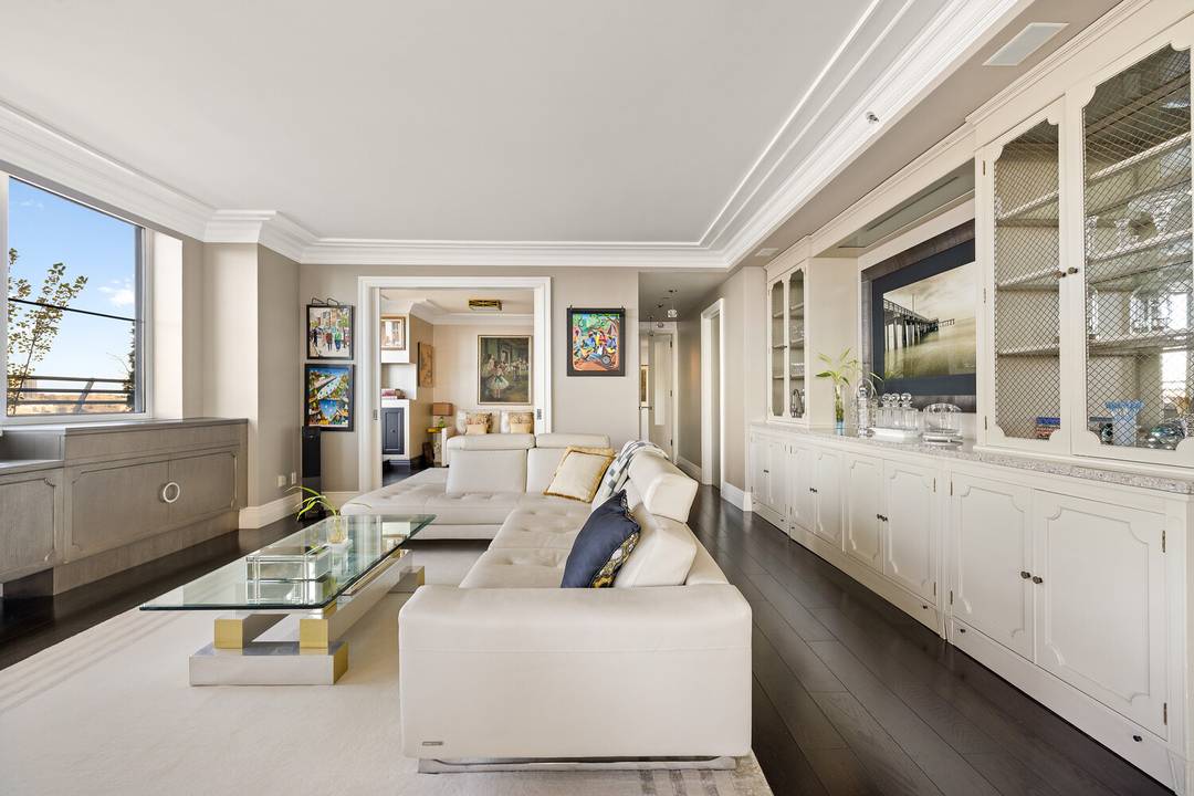 Experience riverfront living at its finest in this expansive four bedroom, four bath residence at 120 Riverside Boulevard.