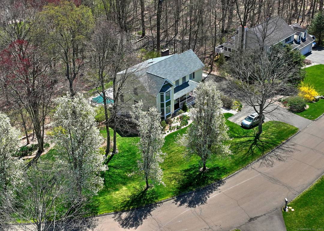 Beautifully maintained 4 bedroom Colonial style home complete with Heated Inground Pool, built in 1994, located in a desirable and secluded subdivision loop.