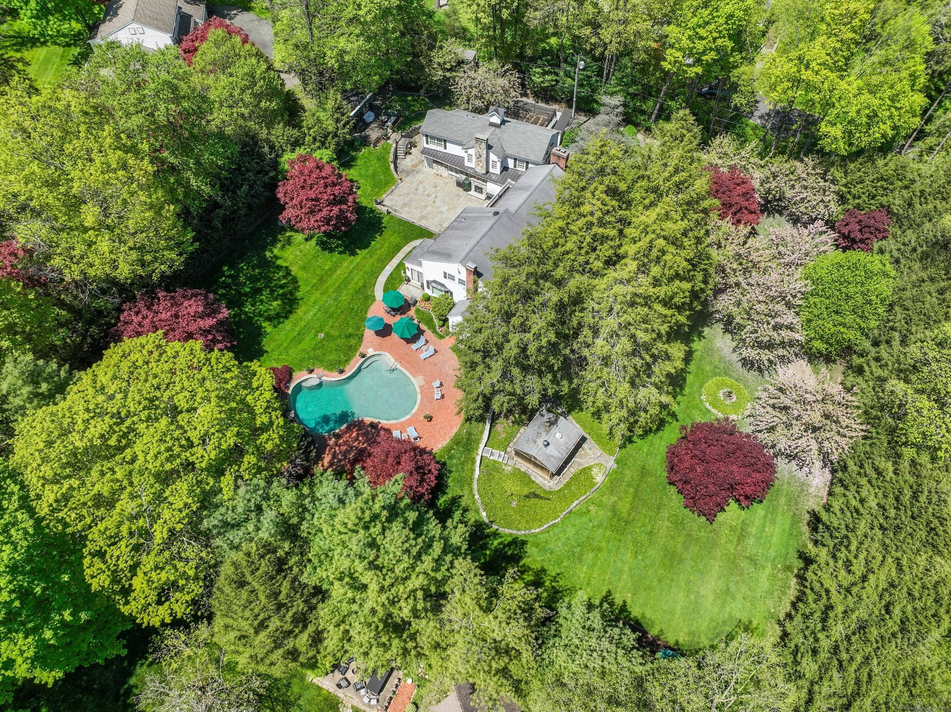 This gracious country estate's idyllic setting is the perfect backdrop for large family gatherings joyous celebrations.