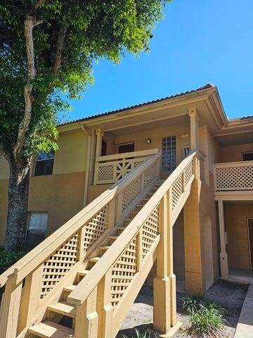Welcome to this charming 2 bedroom, 2 bathroom condo in West Palm Beach, offering a peaceful lake view right from your own private balcony.