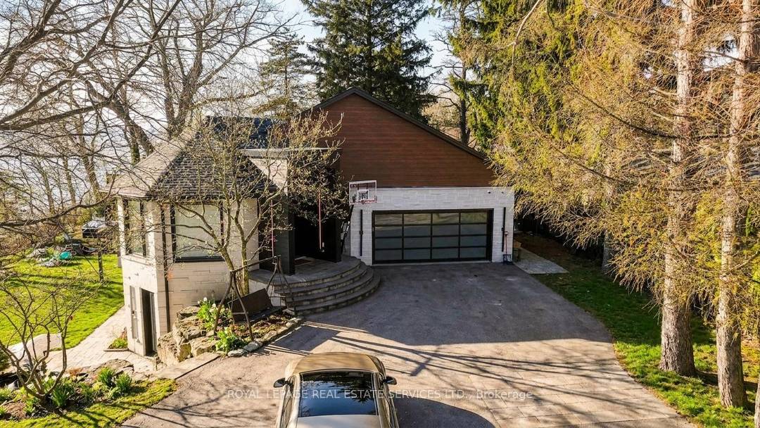 Perched directly on the shores of Lake Ontario with sweeping, unobstructed water views, this exceptional 4 bedroom, 6 bathroom bungalow offers over 5, 200 square feet of beautifully finished living ...
