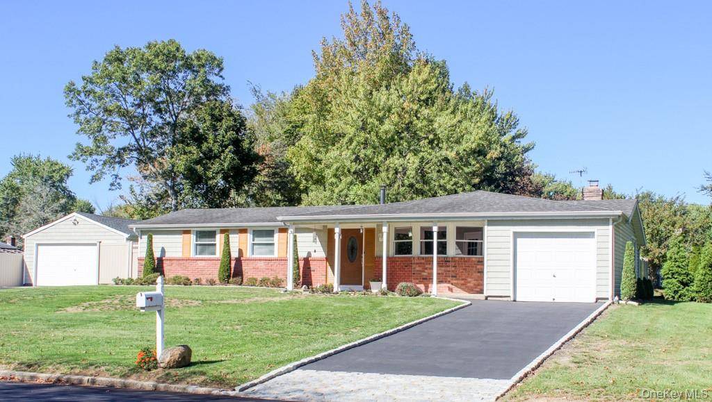 This charming 3 bedroom, 2 bath ranch offers easy one level living on a beautifully landscaped.