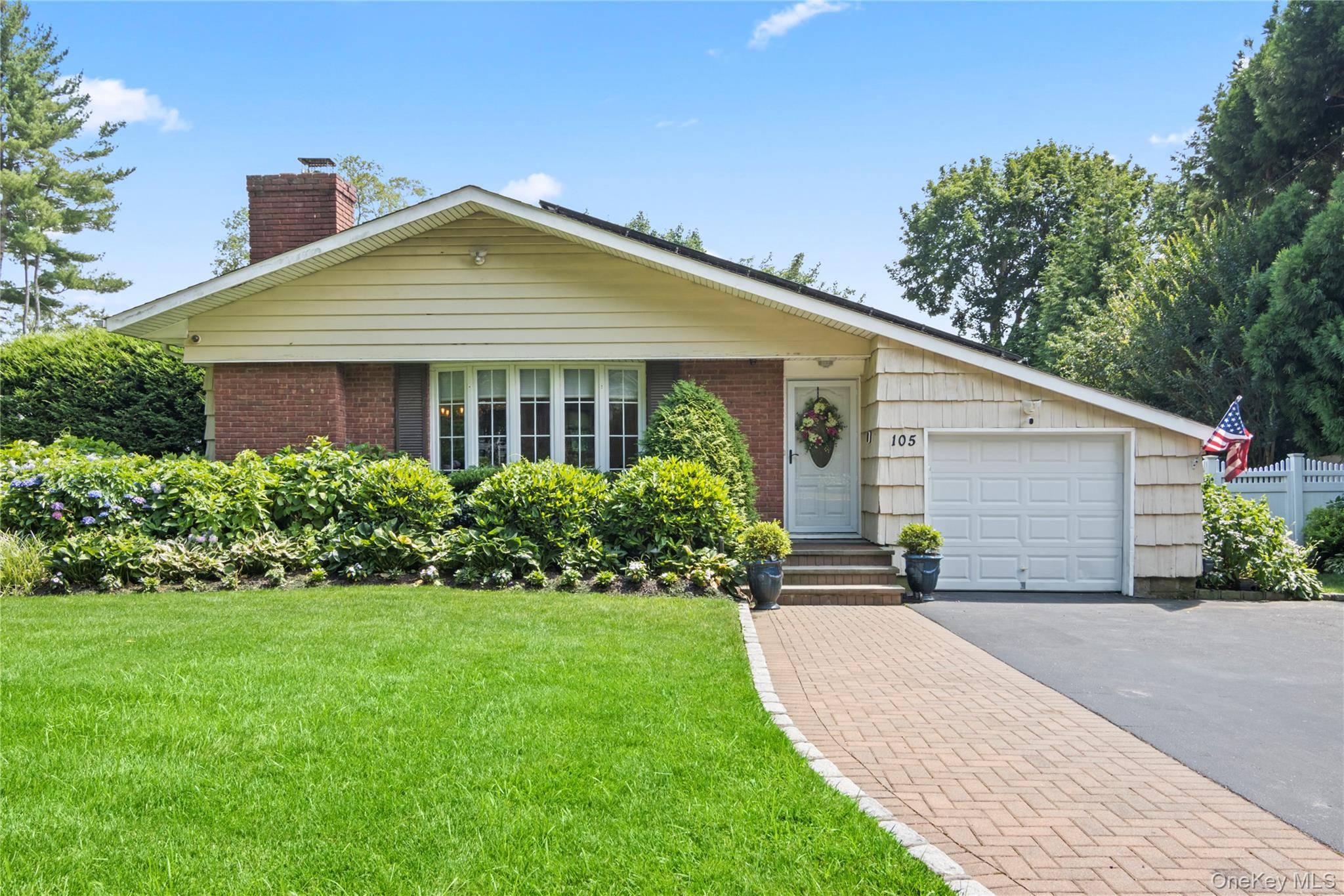If you want privacy and easy living, welcome to 105 Midway Ave !