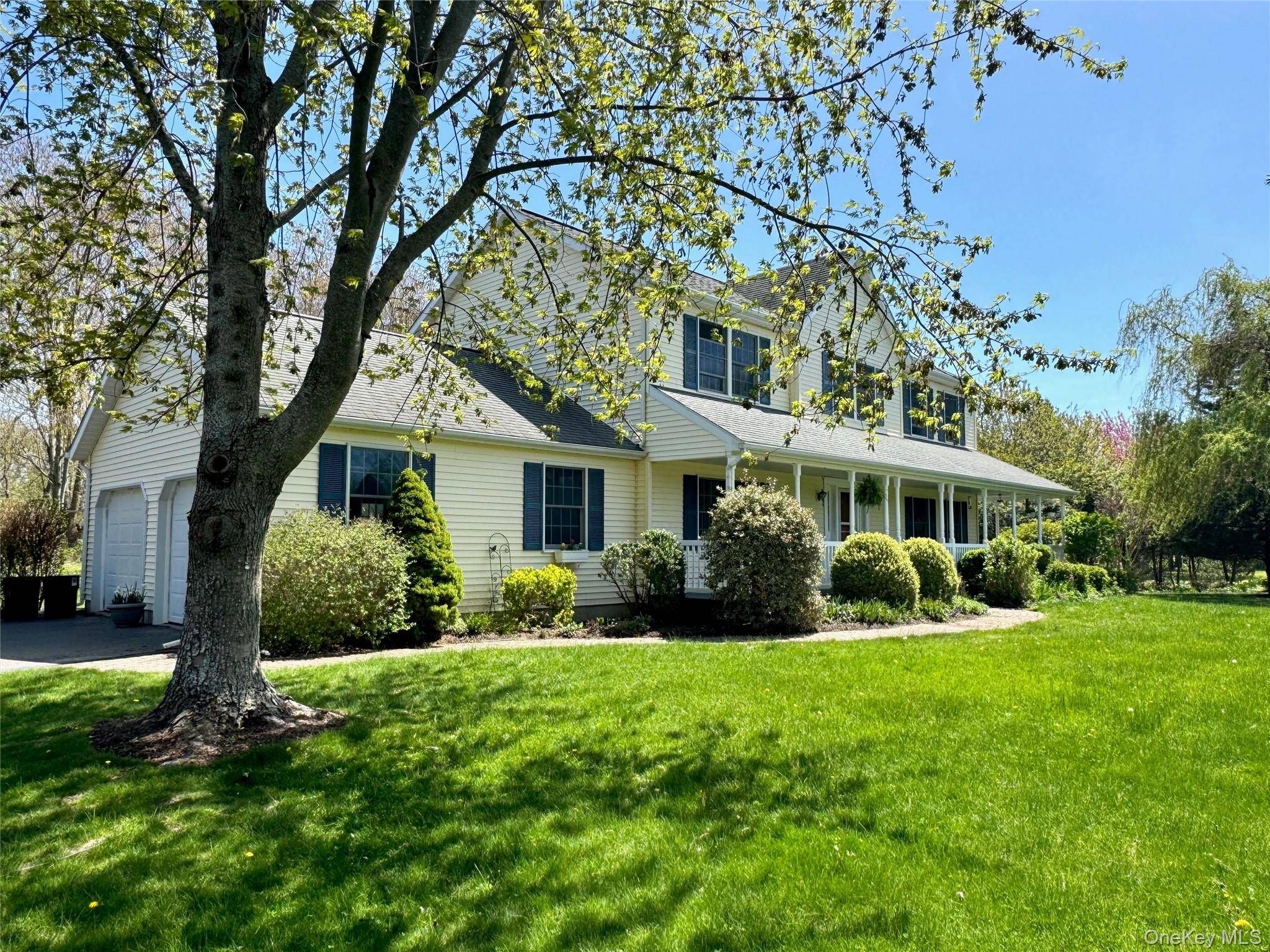 Welcome to 4 Simeon Road in coveted Jamesport.