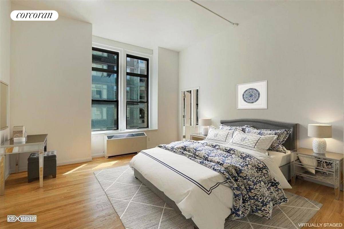 Beautiful, renovated, and spacious FULL FLOOR 4800 Square foot 4 Bedroom 3 Bathroom loft located in the heart of Tribeca !
