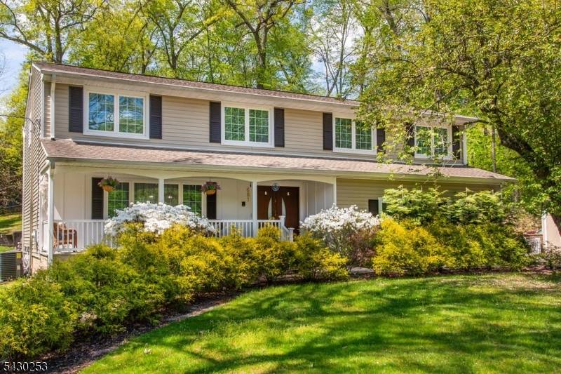 Move right into this beautifully updated, partially furnished 4 bedroom, 4 full bath Colonial, ideally situated on a peaceful cul de sac in Franklin Lakes.