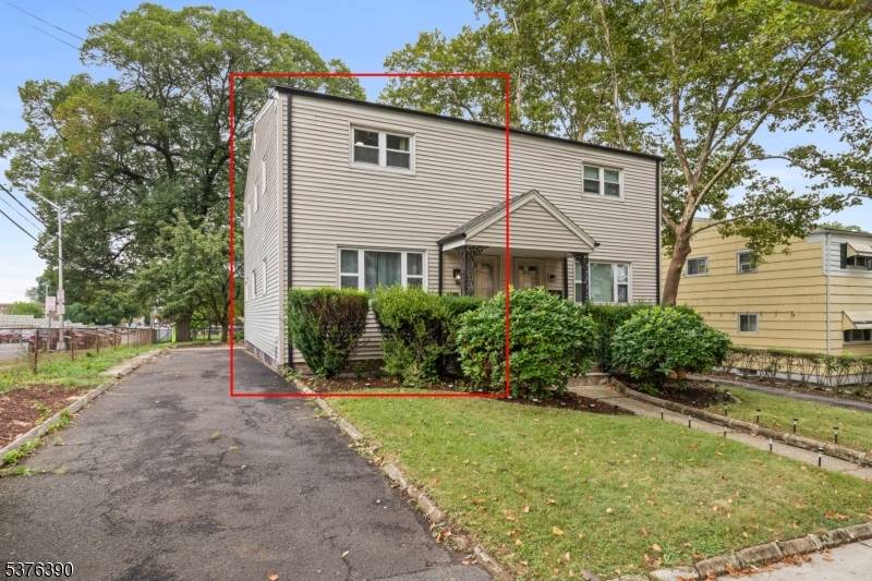 Welcome to 401 White St, a half duplex home in the desirable neighborhood of Orange just blocks away from West Orange, Montclair and Maplewood.