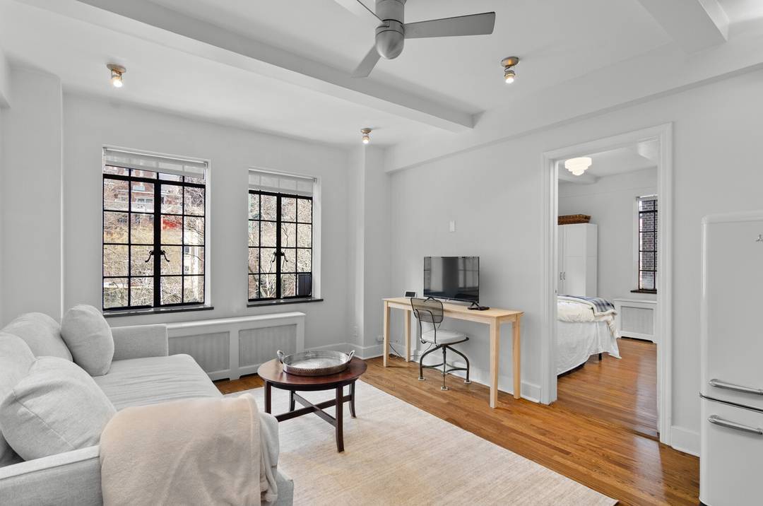 PRICE REDUCED ! Renovated Corner 1 Bed in Tudor City with Landmark Views of the Chrysler Building !
