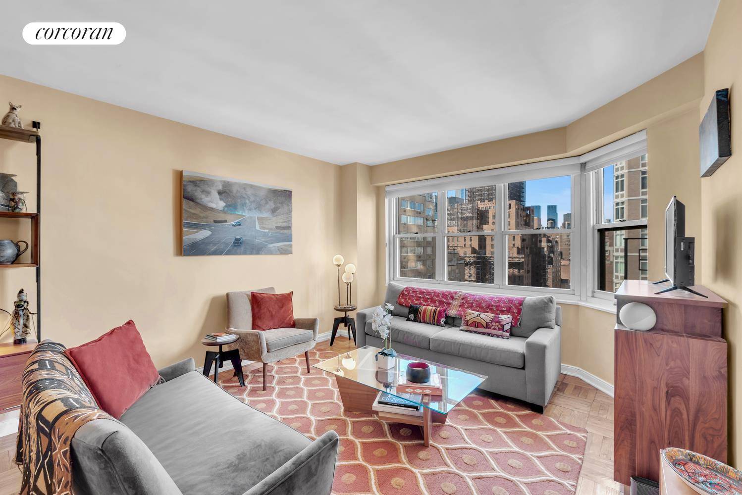 This charming and generously sized one bedroom home is ideally situated on the 14th floor of a prestigious Upper East Side co op with exceptional service, including a 24 hour ...