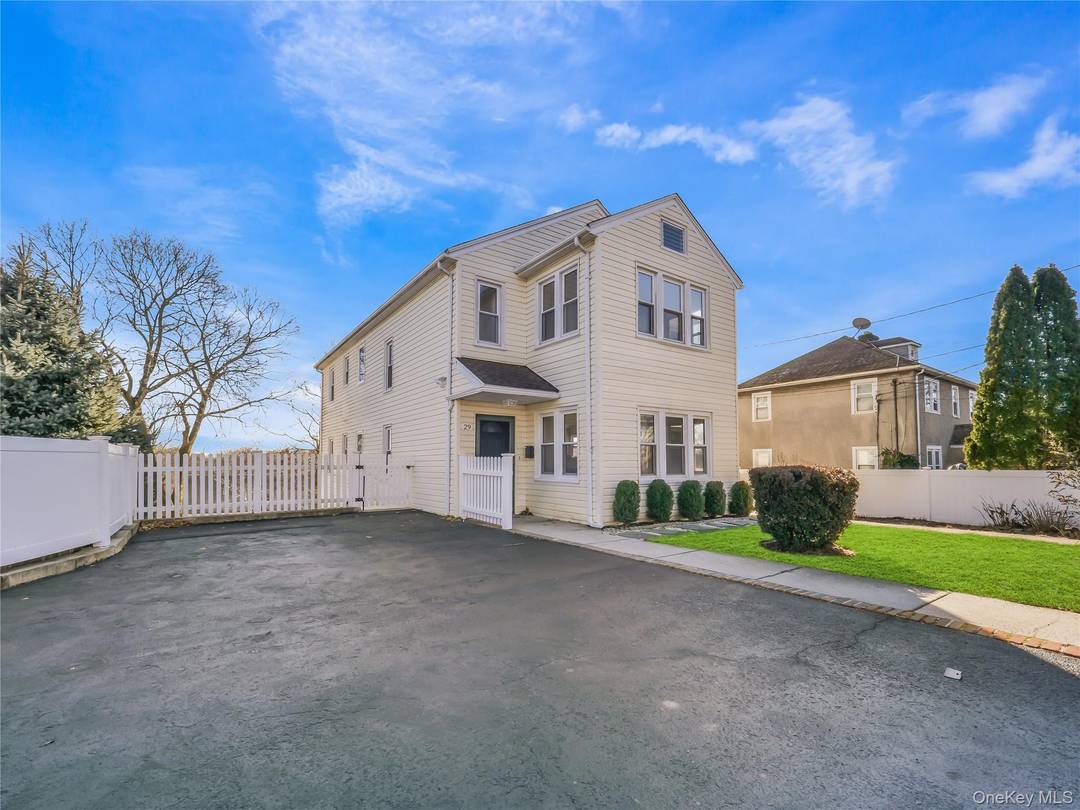 Beautifully renovated 3 Bedroom 2 Full Bath in a 2 Family Townhome.