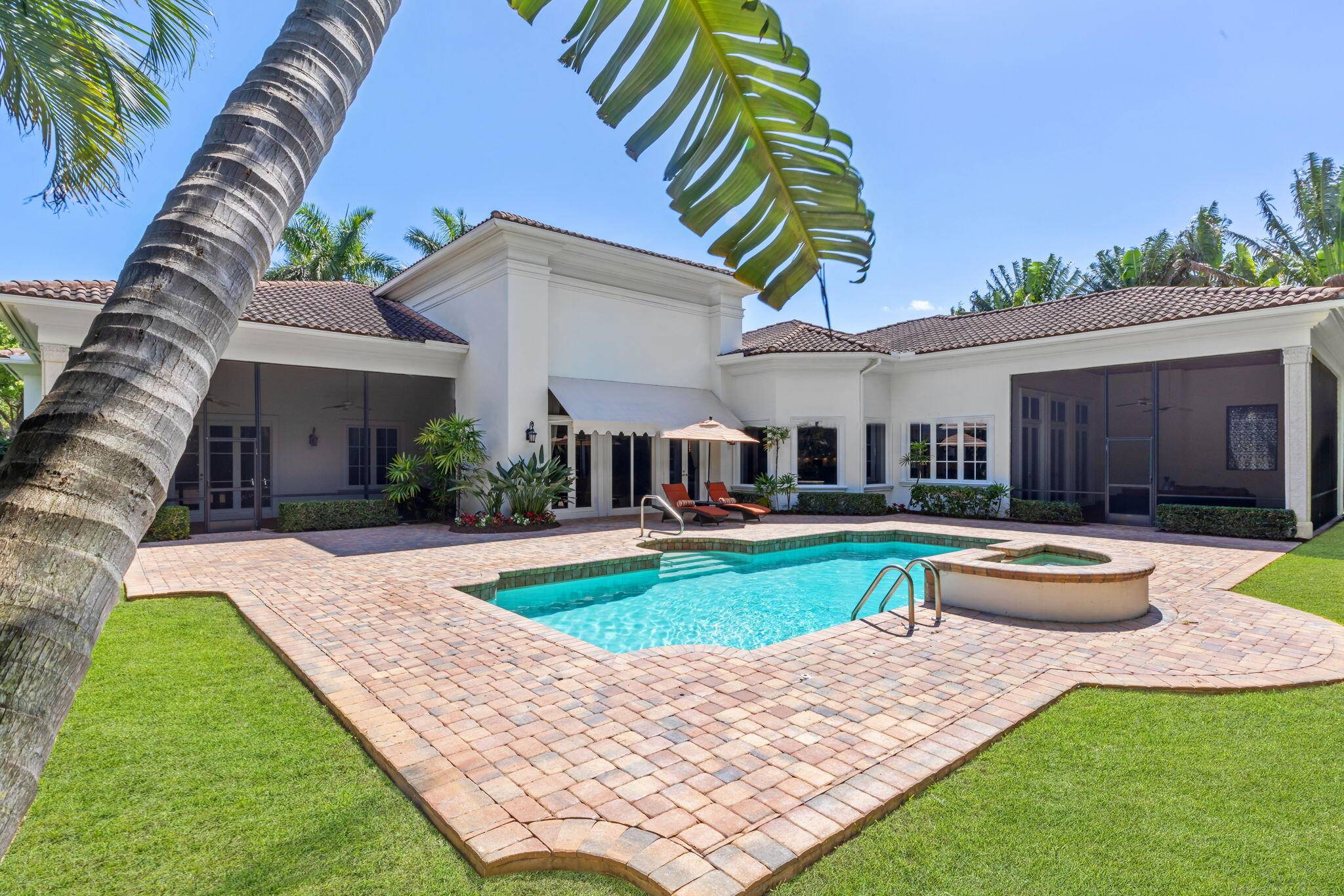 Introducing an extraordinary estate situated in The Sanctuary, one of Boca Raton's most coveted communities.