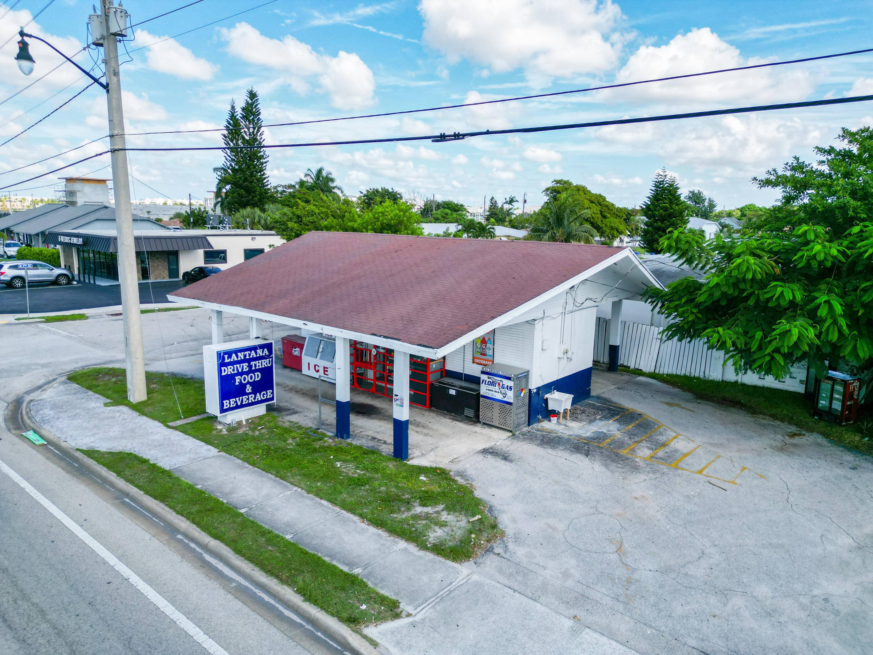Exceptional investment potential awaits in this unique package, combining a thriving drive through grocery store business with valuable real estate.
