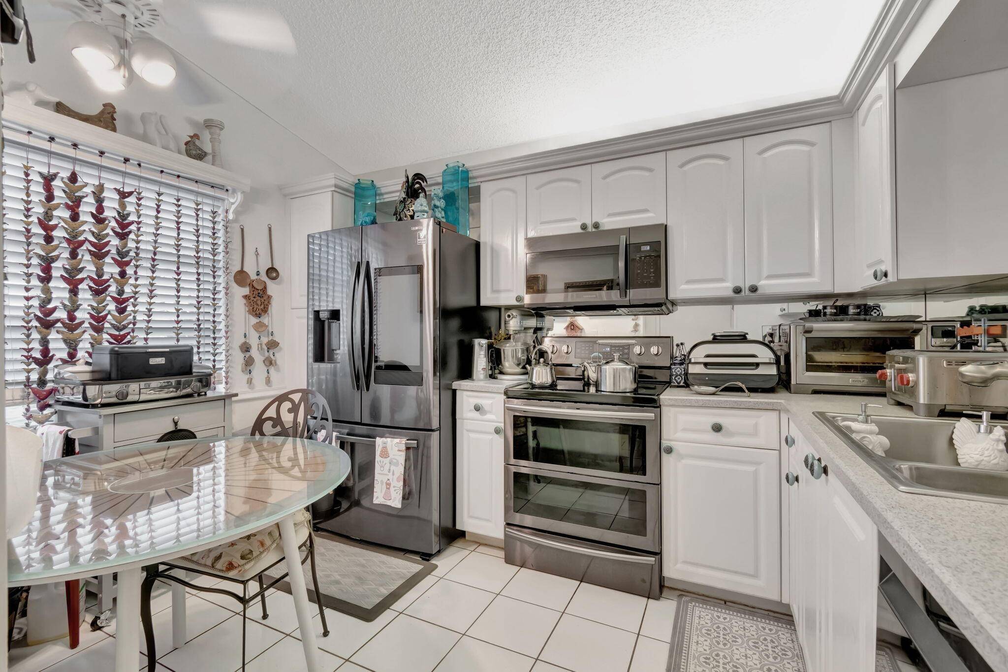 Introducing a stunning, distinctive Majorca model villa at 6182 Pointe Regal Circle in the esteemed and dynamic adult community of Huntington Pointe, Delray Beach, Florida.