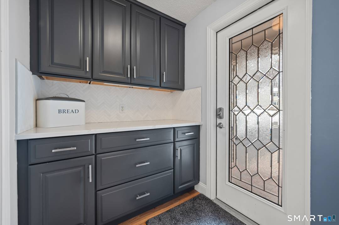 Welcome to 87 Gail Lane, a beautifully updated 6 bedroom, 3.