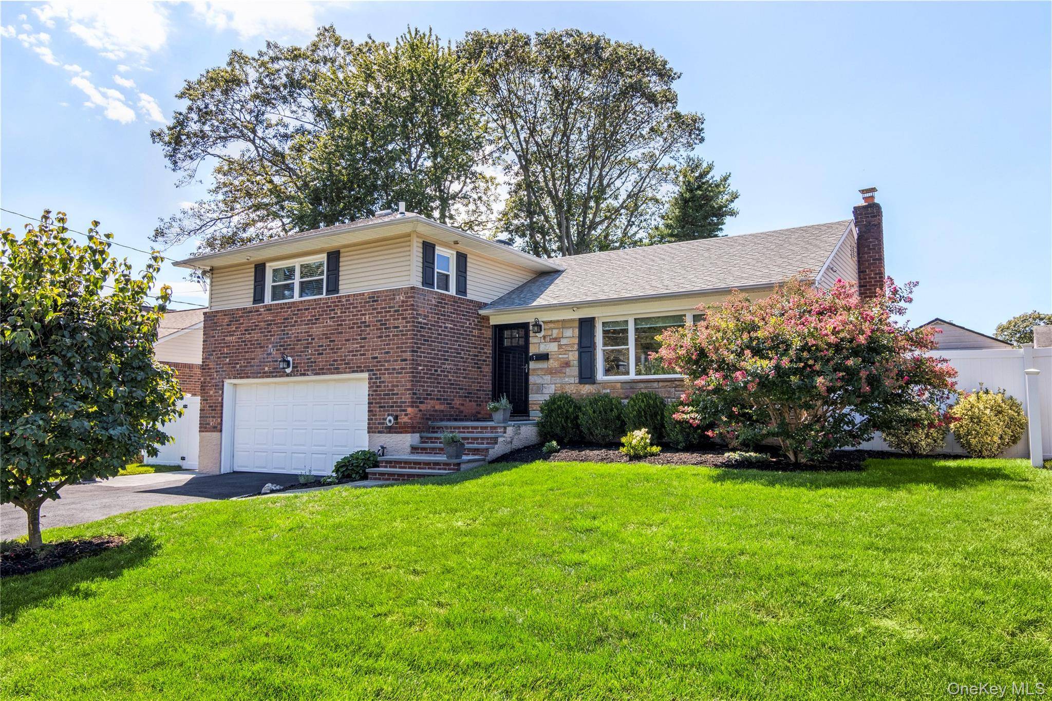 Welcome to 7 Driftwood Drive, a haven of sophisticated elegance and modern convenience.
