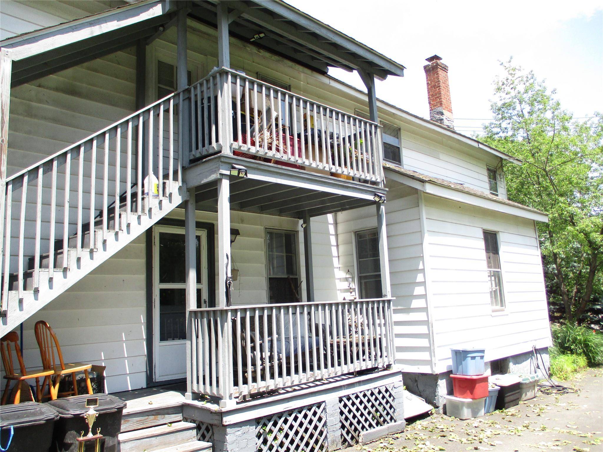 Price adjustment... Rare opportunity this legal two family, 3 bedroom 1 bath washe dryer hook up on first level with enclosed front porch and fireplace in living room.