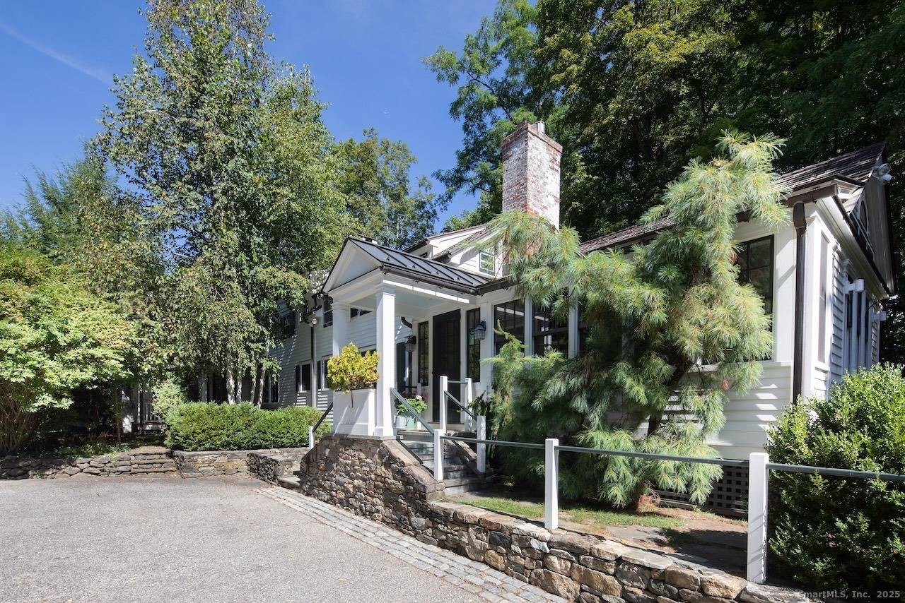 This 1807 New England home stands prominently in Salisbury's Historic District, gracing 1.