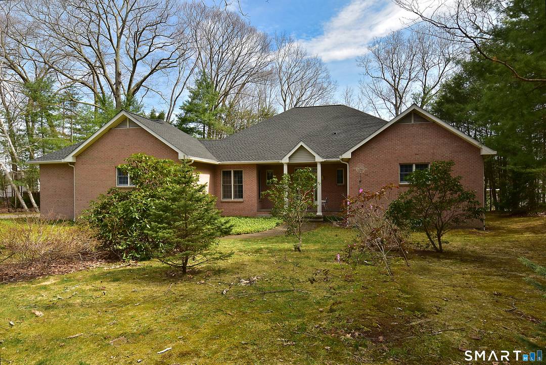 Set on the shore of Crystal Lake, this exceptional lakefront ranch offers 52 feet of direct waterfront with breathtaking, unobstructed views.