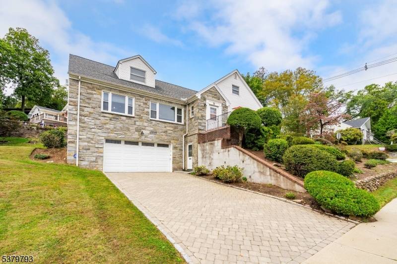 Spacious 5 bedroom, 3 bath Colonial Cape located in the highly sought after Gregory section of West Orange, featuring stunning New York City views.
