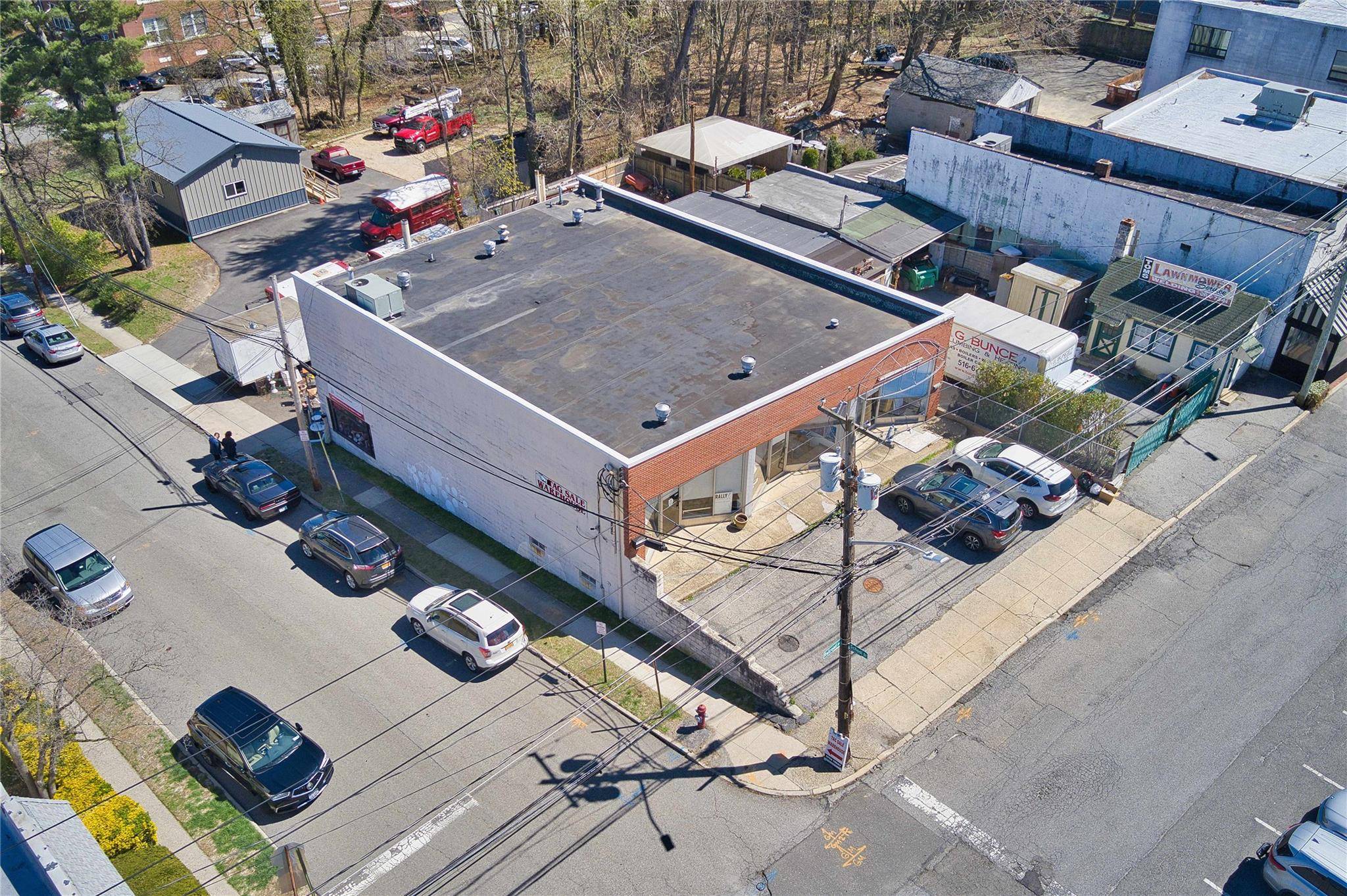 Welcome to 22 26 Railroad Avenue, a rare and versatile property offering incredible potential in one of Nassau County s most desirable communities.