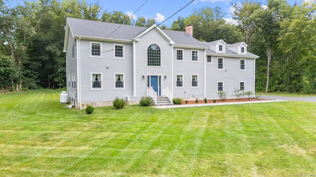 Rebuilt in 2024, this exceptional 5 bedroom, 4.