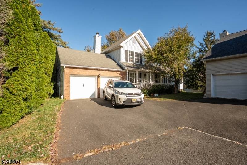 Welcome to this beautiful 1833 sq ft Southeast facing home featuring a covered front porch and a decorative entry door that sets the stage for what's inside.