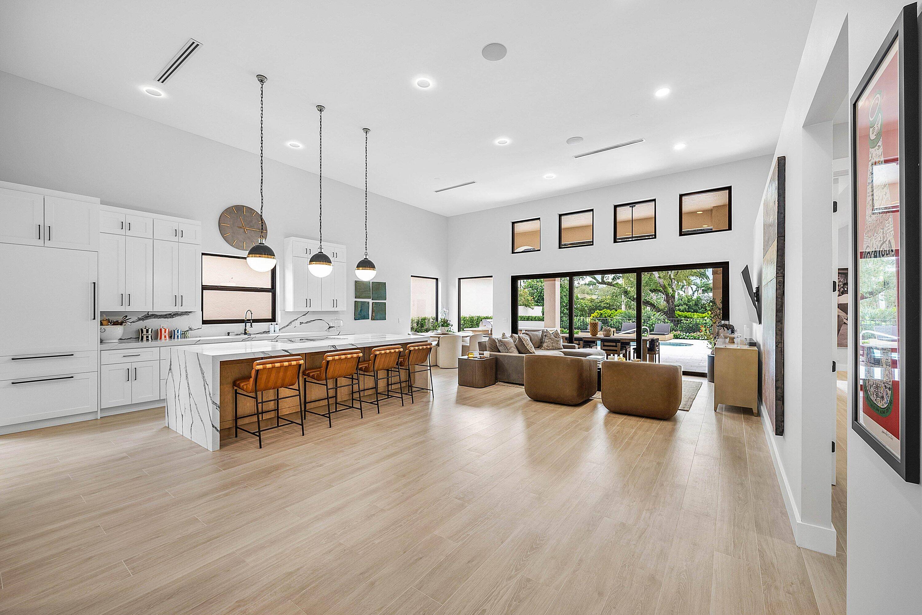 This stunning Restoration Hardware decorated home is located in the heart of Boca Raton, within the prestigious Broken Sound Country Club and near the city's top rated schools.