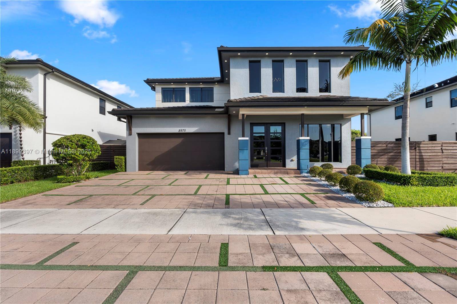 Stunning modern residence in Miami Lakes featuring 4 spacious bedrooms and 3 elegant bathrooms.