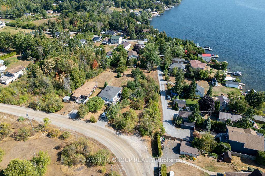 This charming quarter acre property offers a rare opportunity to enjoy the beauty of Balsam Lake with deeded access just steps away.