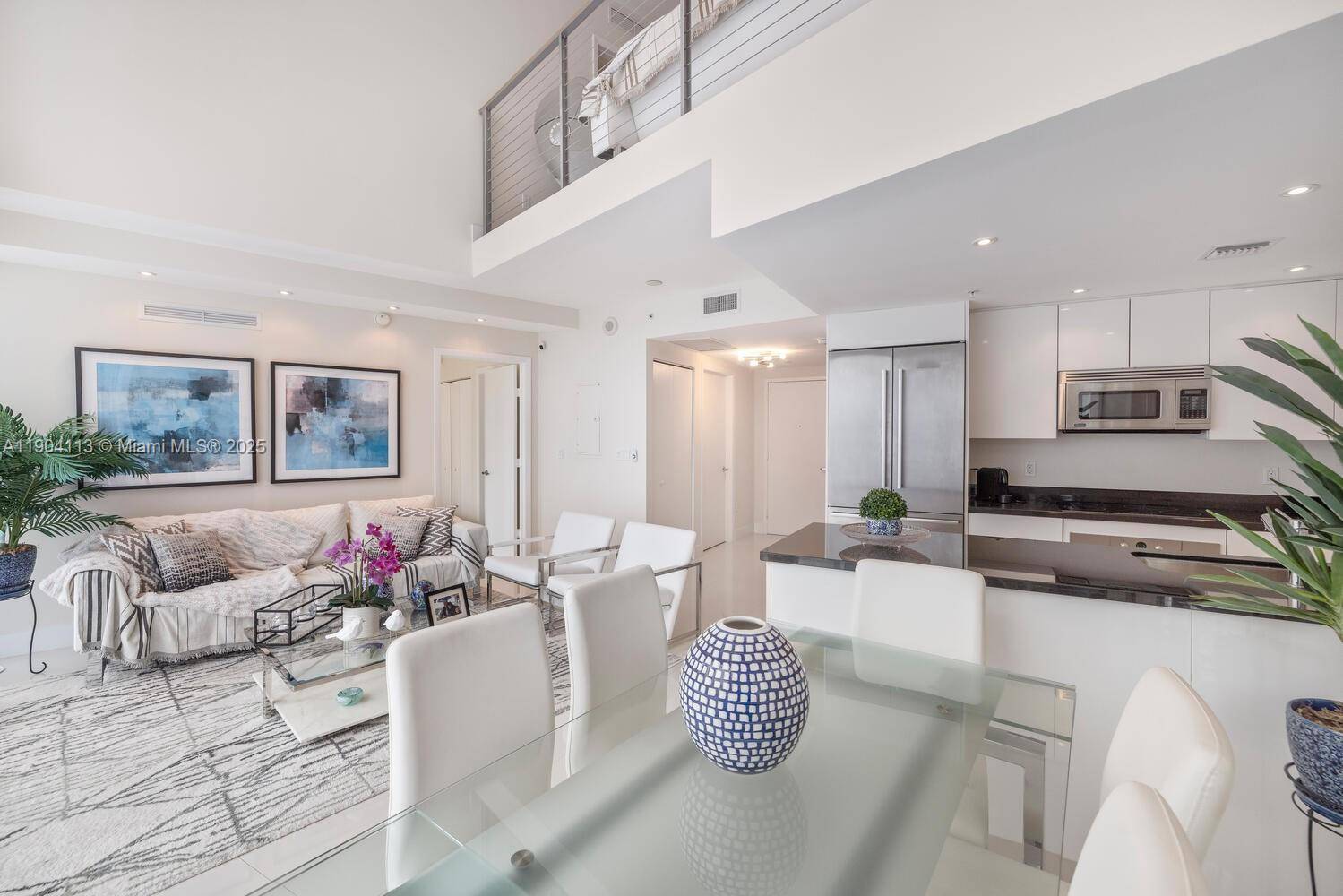 Step inside to find high ceilings and an open, airy layout that enhances the flow of natural light throughout.