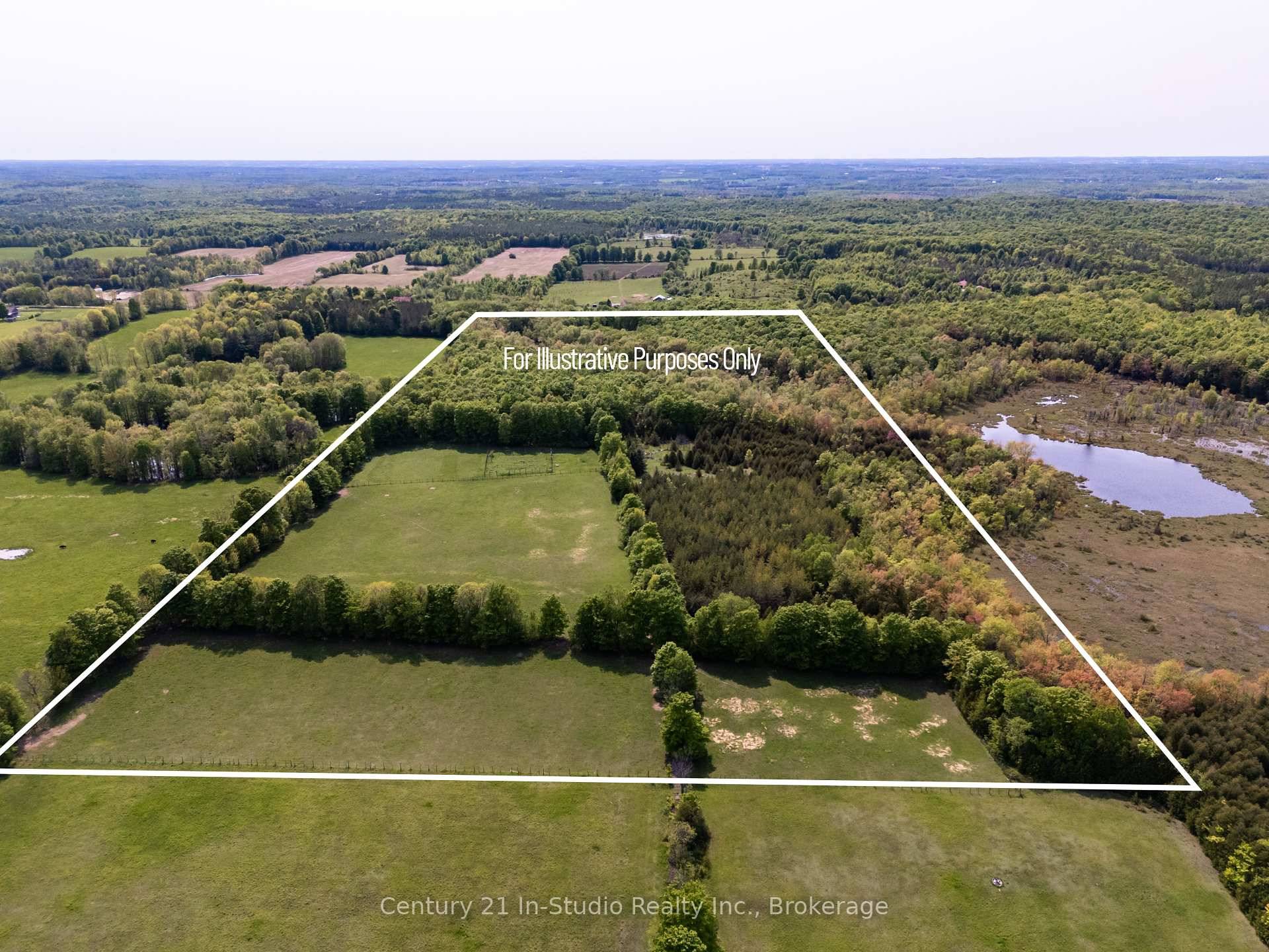Tranquil 49 acre retreat with a breathtaking 2008 Shouldice Stone bungalow nestled behind a serene pond.