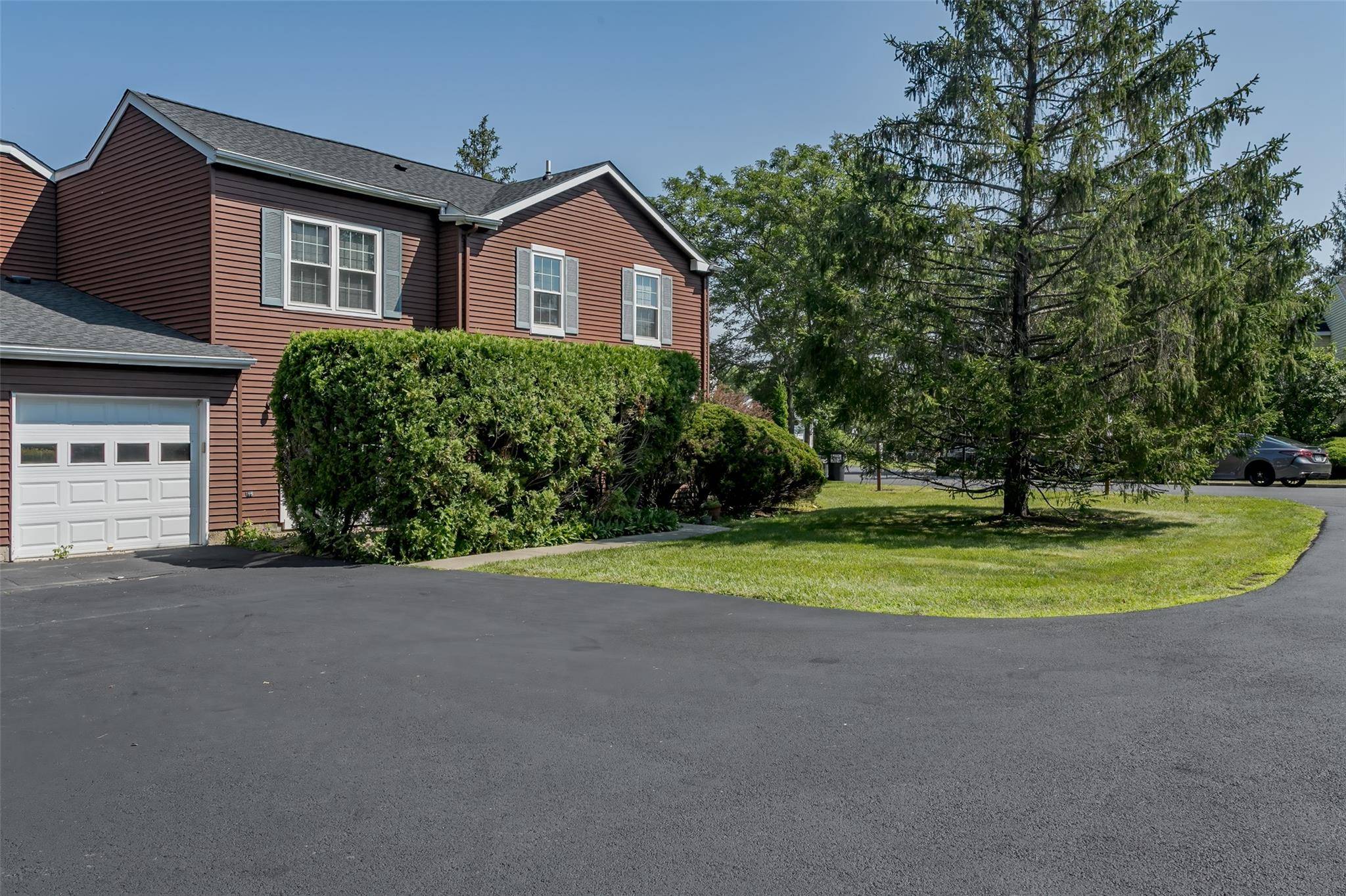 Spacious townhome with 2 car garage located in Homestead Village.