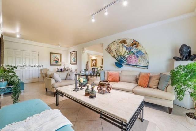 EXCELLENT LOCATION ! Bright and spacious 2, 750 square foot unit with impact doors and windows and four East facing balconies has two master suites at opposite ends, plus a ...