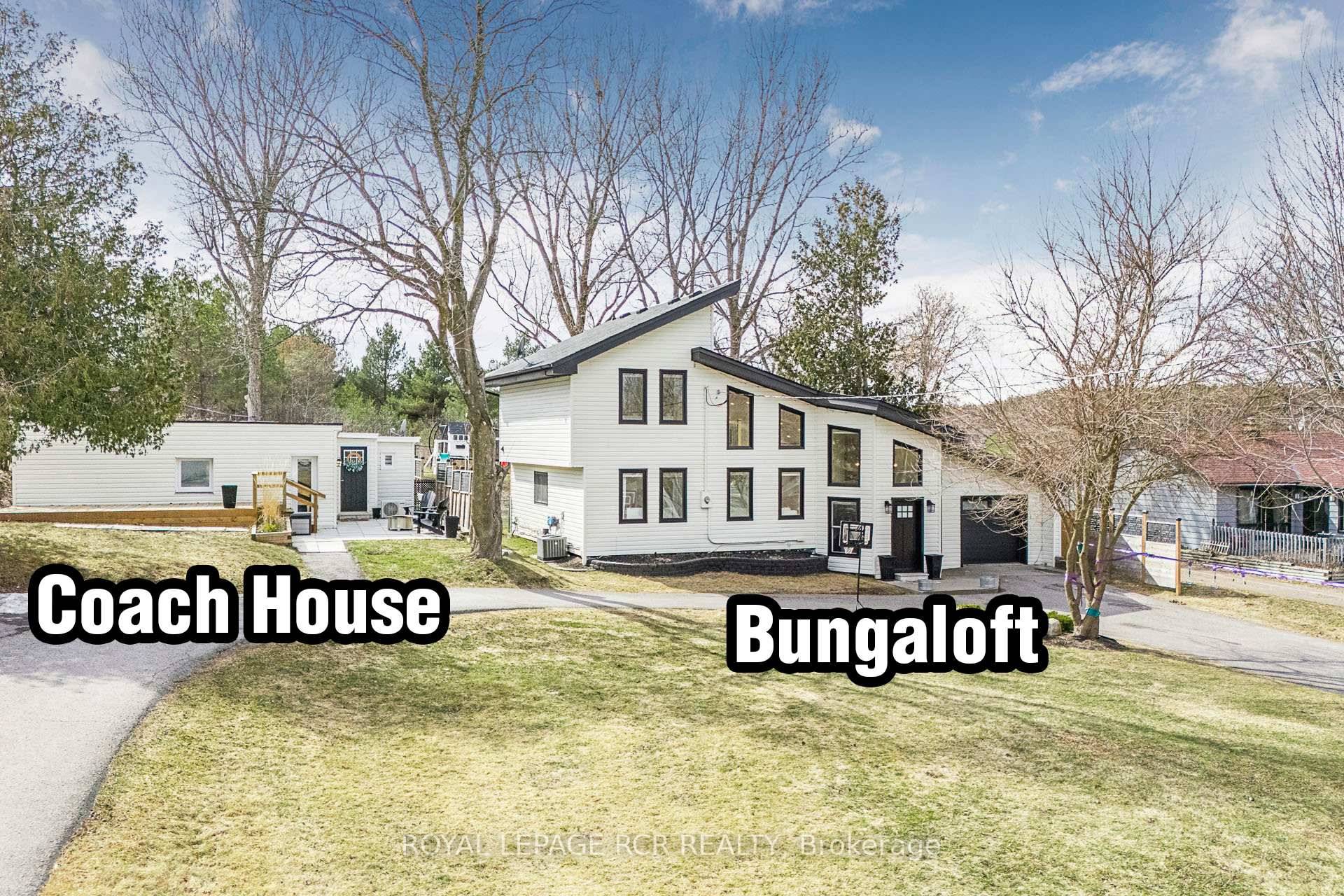 Wow Designer renovated vaulted ceiling Bungaloft and cute separate full service coach house !