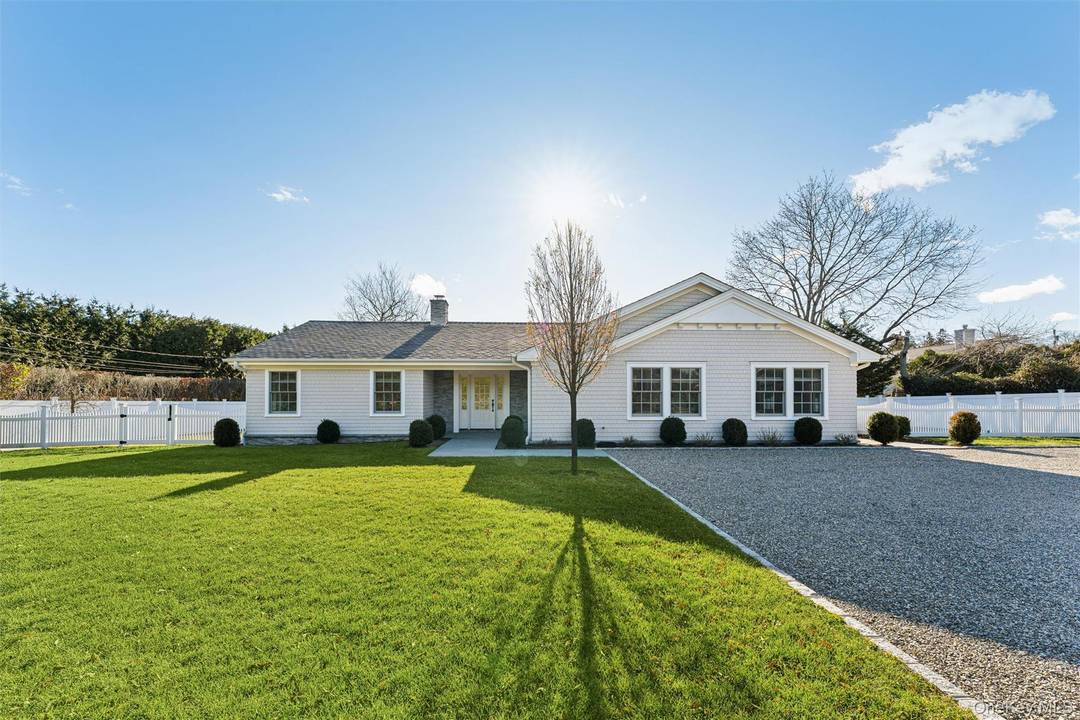 Beautifully renovated in 2023, this traditional Hamptons style three bedroom, three bath ranch offers 2, 590 square feet of refined single level living in Westhampton Beach.