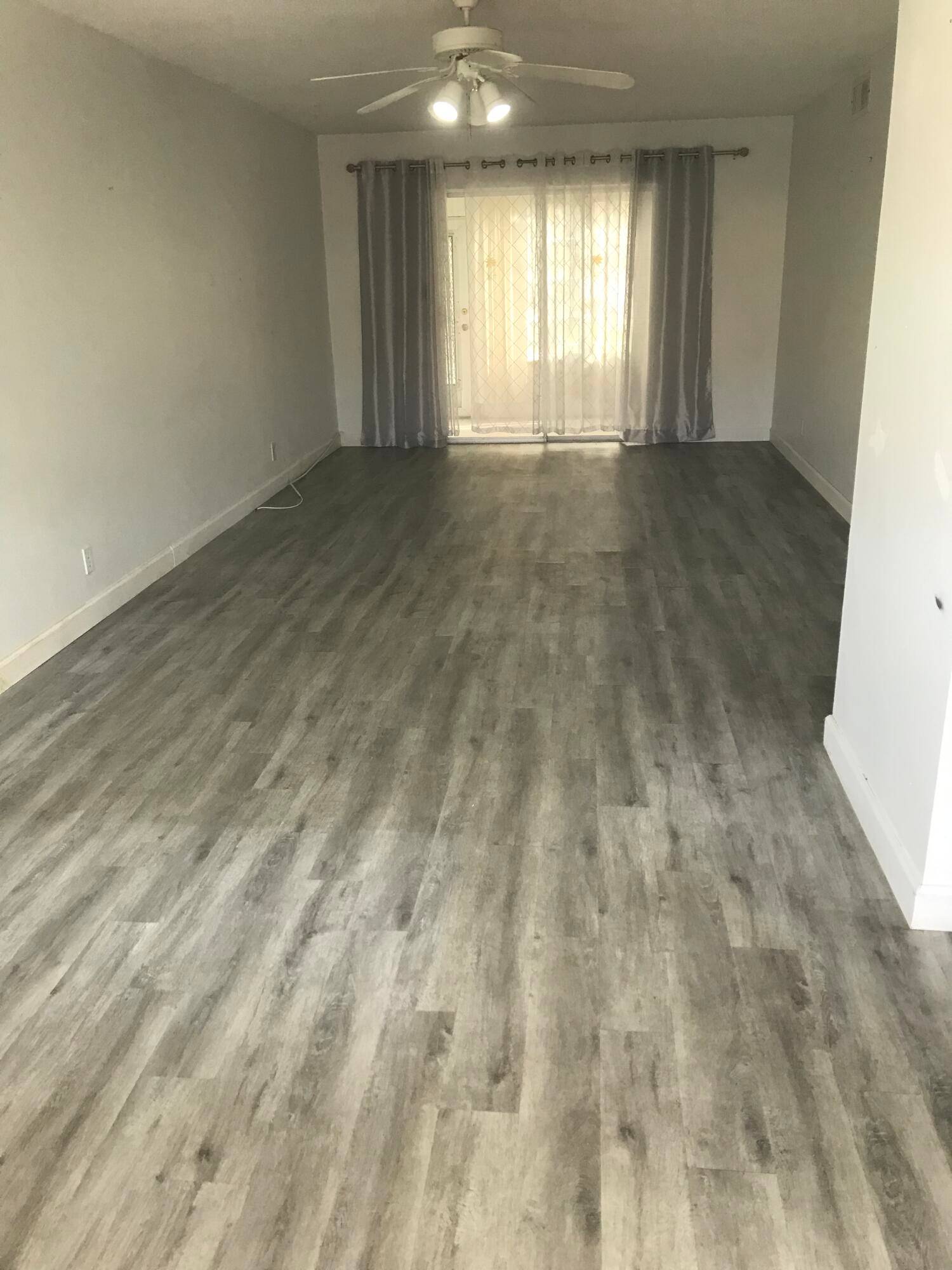 1st Floor Unit in 55 community with assigned parking space about 20 feet from front door.