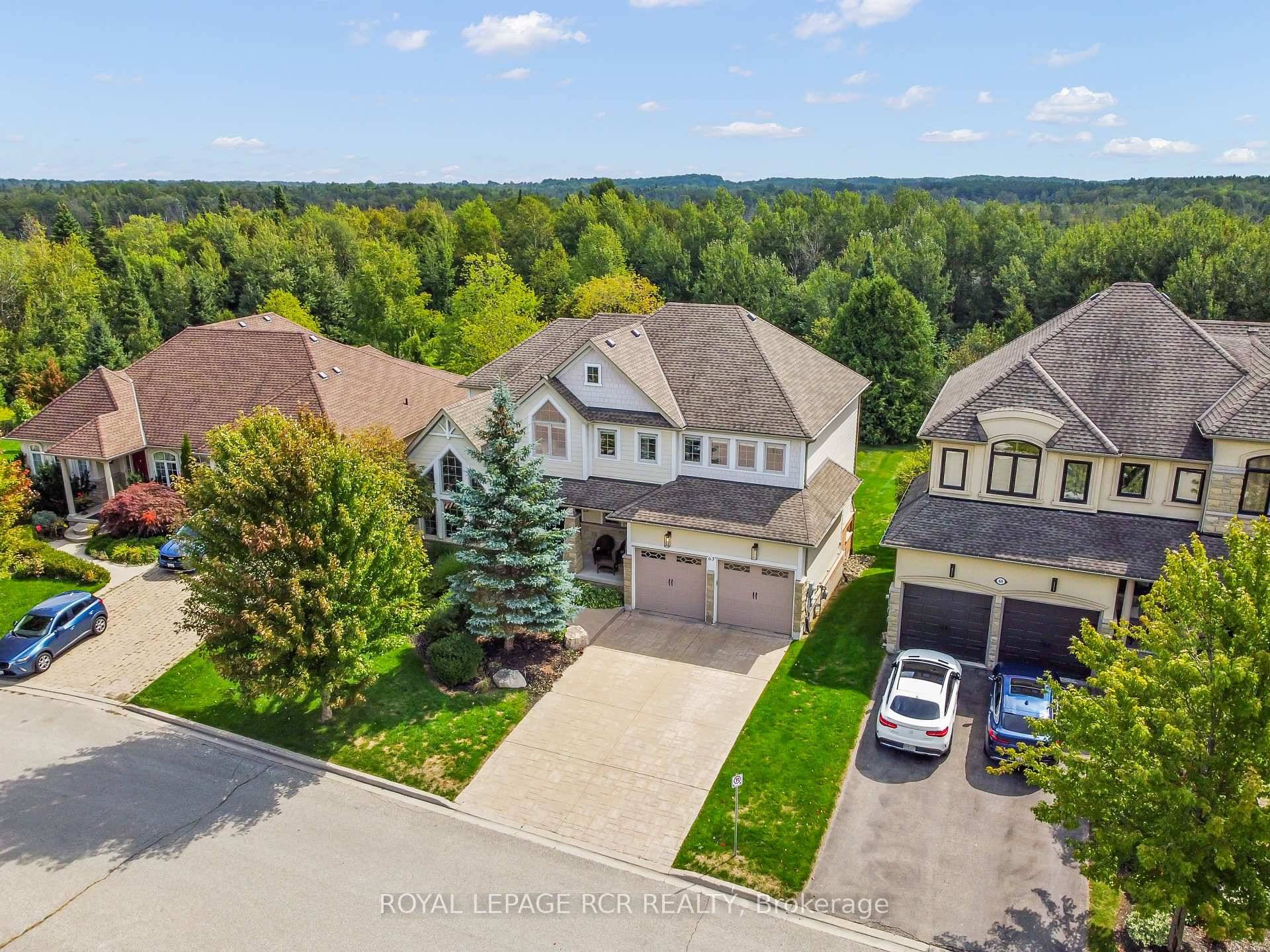 Tucked away within the quiet cul de sac of Credit Springs Estates, this Berkshire built residence offers refined living on a mature lot backing onto conservation with a sun drenched ...