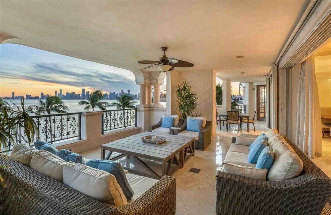 Enjoy breathtaking, unobstructed views of Biscayne Bay, the Miami skyline, Virginia Key, and the Atlantic Ocean from this elegant 4BR 4.