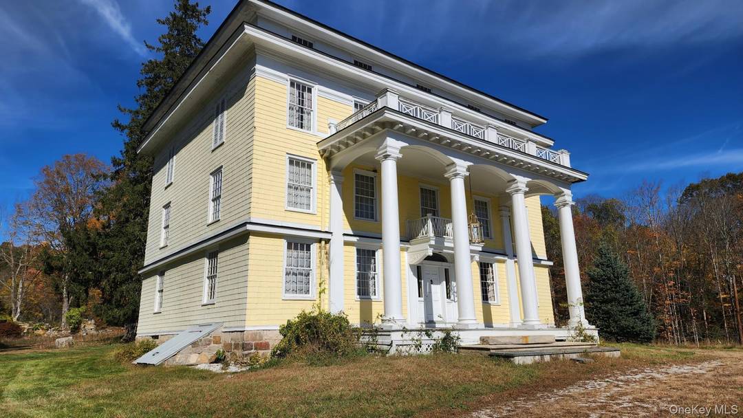 1827 Greek Revival Colonial with many of the period features.