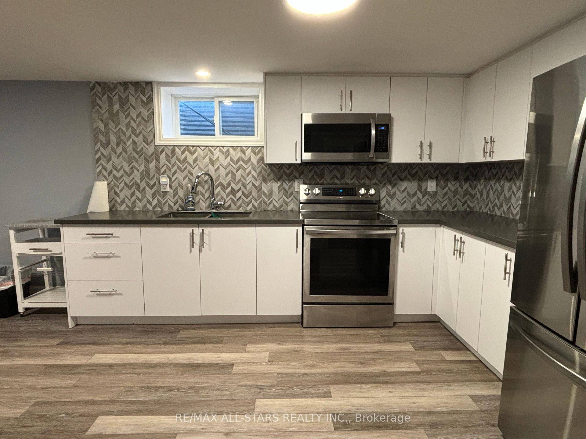 Step Into This Tastefully Renovated Basement Apartment, Offering A Perfect Blend Of Style And Comfort.