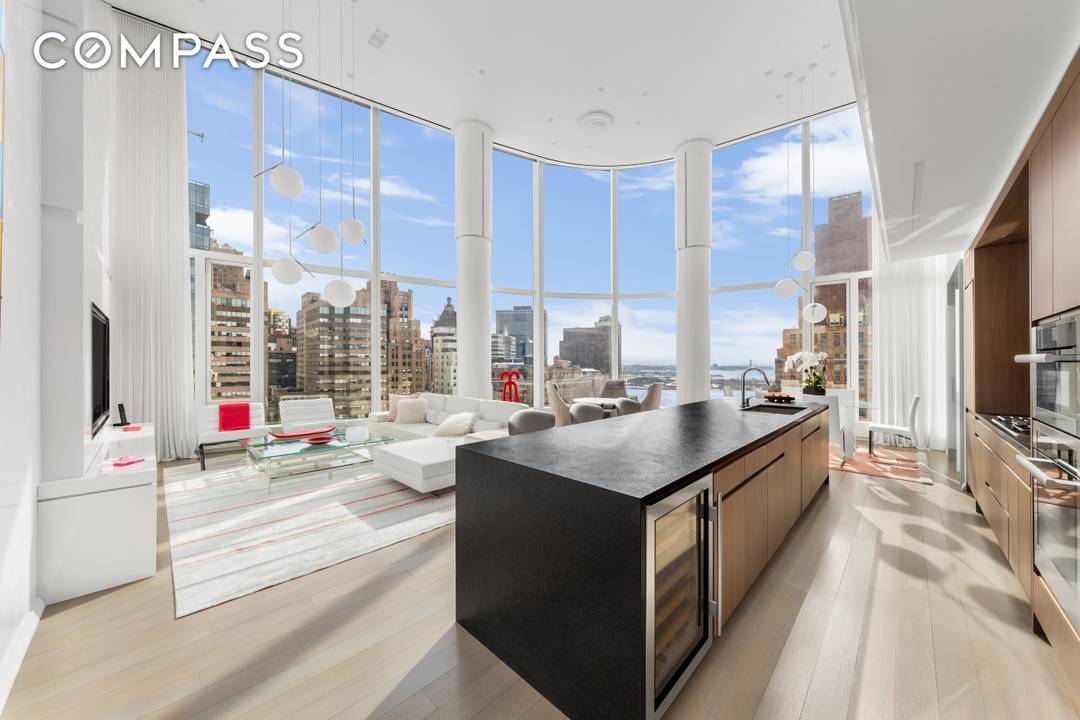 A Bespoke Masterpiece at 50 West Street Designed by internationally acclaimed interior designer Jennifer Post, Residence 30B is a meticulously curated, fully customized home that transcends the standard sponsor offering.