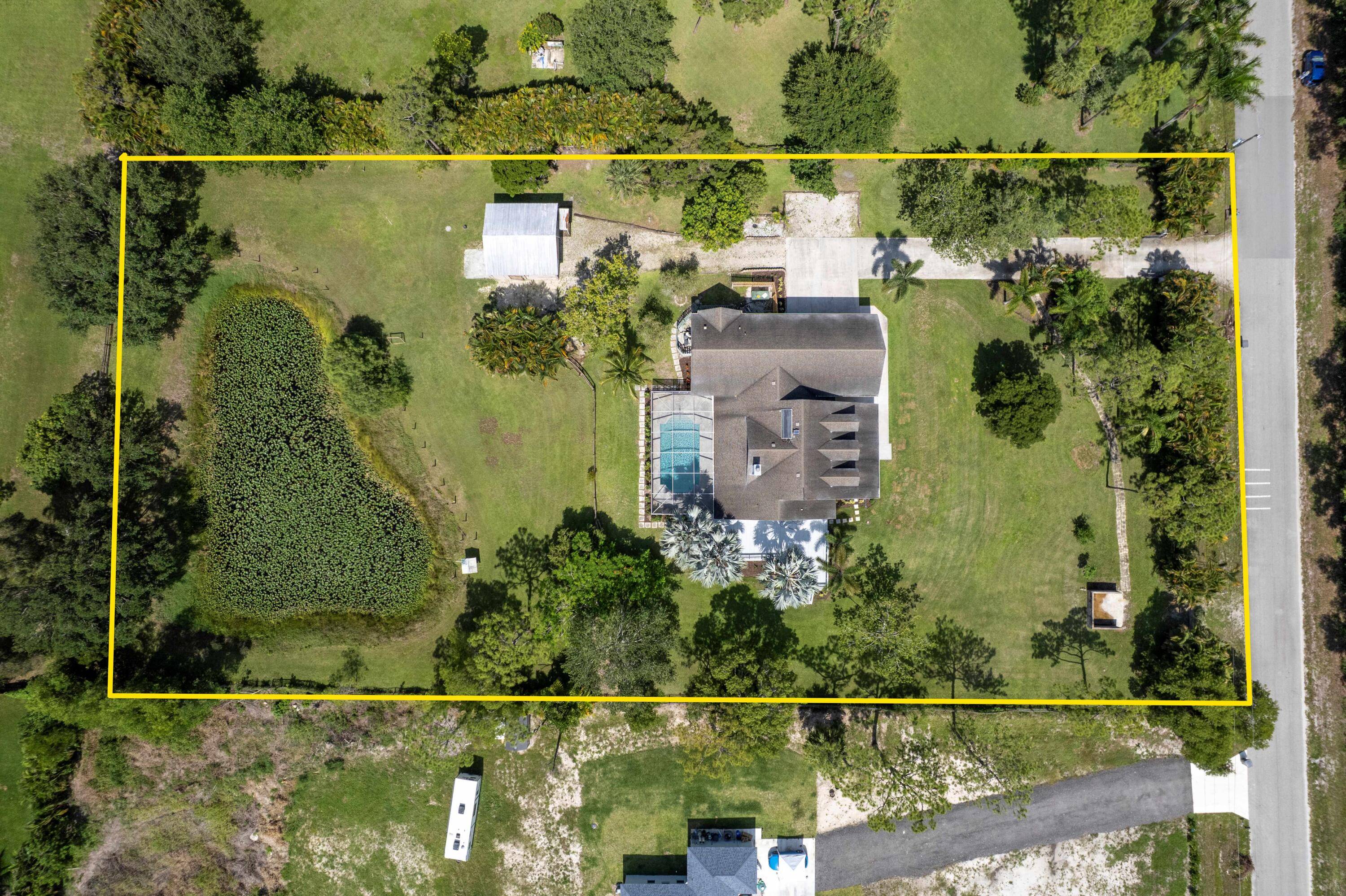 A MUST SEE ! ! Beautiful remodeled 2 story 5B 3B home on a 2.