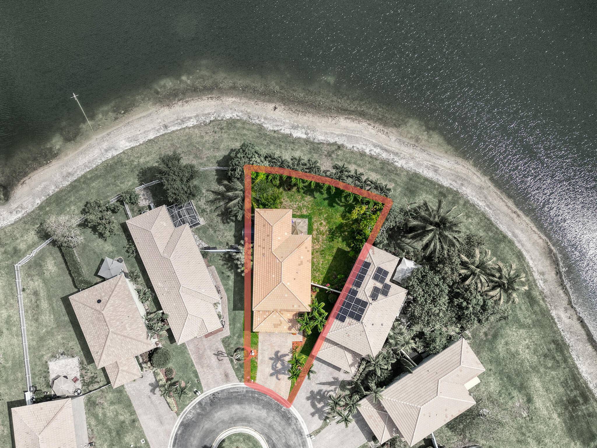 Beautiful lakeside home with large backyard off a private cul de sac.